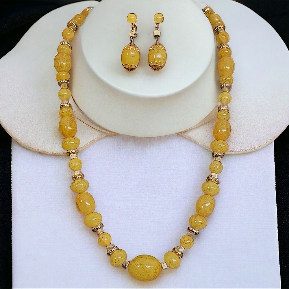 Hong Kong bold Lemon lucite Necklace Set. The Necklace is 28” Long end to end.